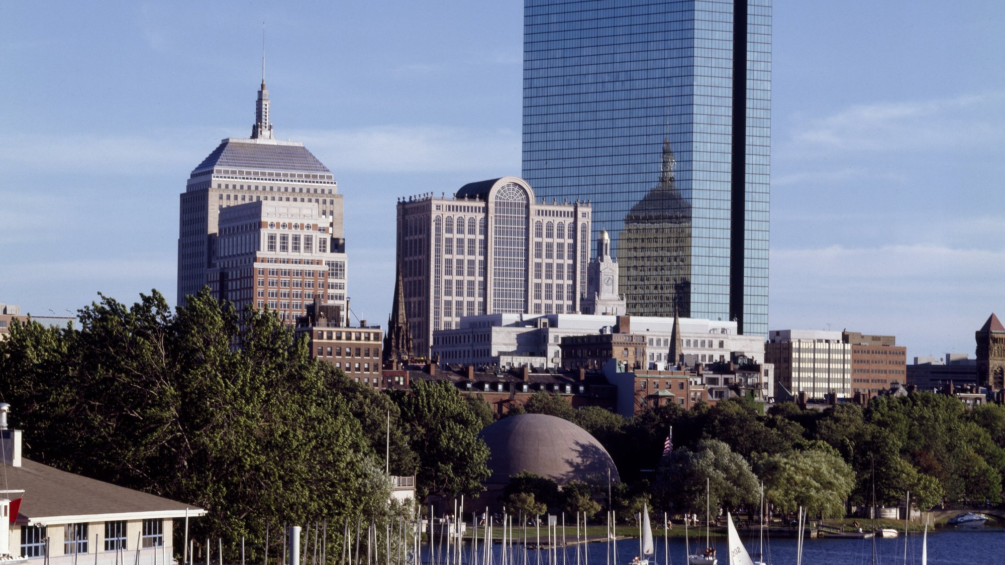 Charles River view of downtown Boston -- I.M. Pei’s John Hancock Tower and the Back Bay skyline (Prudential Tower, MIT Great Dome-style Cambridge boathouse) fro
